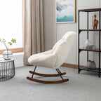 Fauteuil à bascule capitonné en tissu bouclé