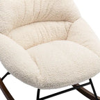Fauteuil à bascule capitonné en tissu bouclé