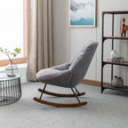 Fauteuil à bascule capitonné en tissu bouclé