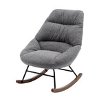 Fauteuil à bascule capitonné en tissu bouclé