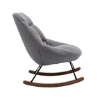 Fauteuil à bascule capitonné en tissu bouclé