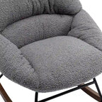 Fauteuil à bascule capitonné en tissu bouclé